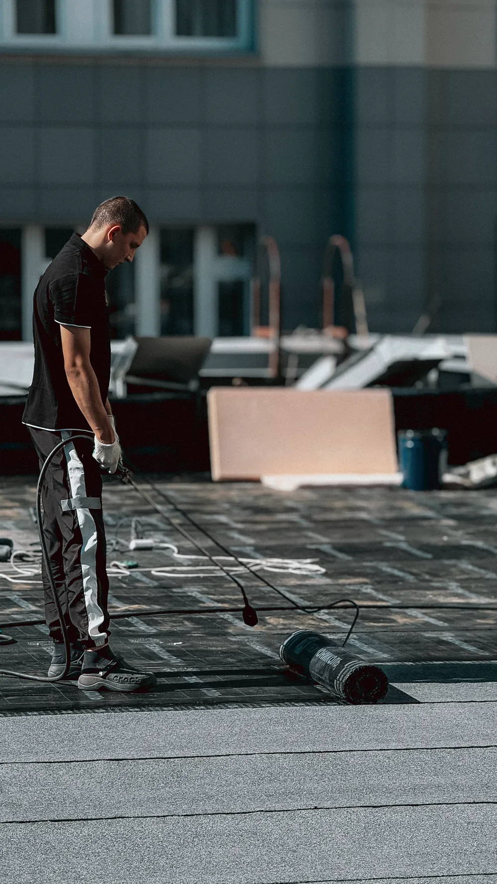 Waterproofing application on a building rooftop